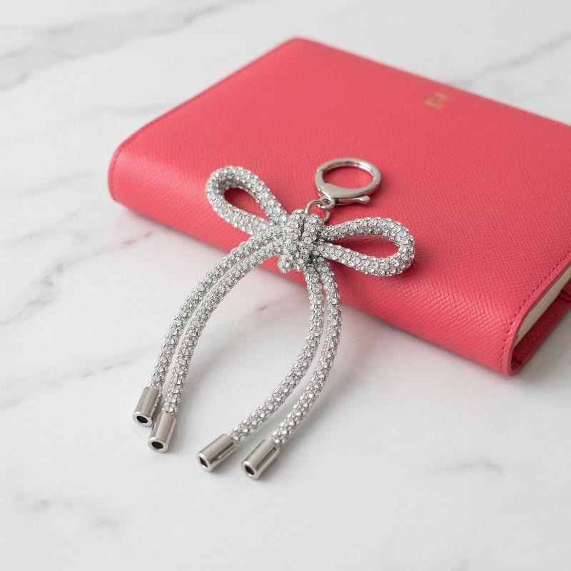 Pendentif nœud papillon en cri - Phone Accessories Ideas avis et prix