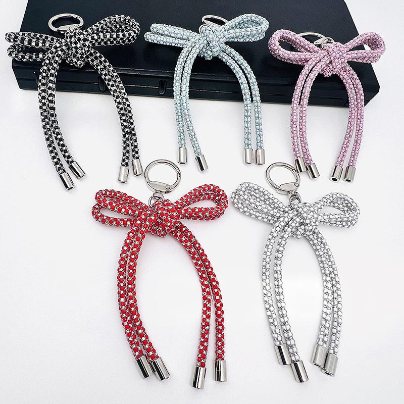 Pendentif nœud papillon en cri - Phone Accessories Ideas avis et prix
