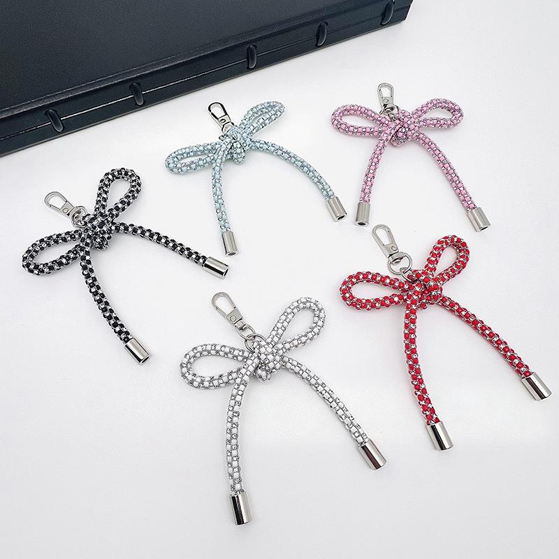 Pendentif nœud papillon en cri - Phone Accessories Ideas avis et prix